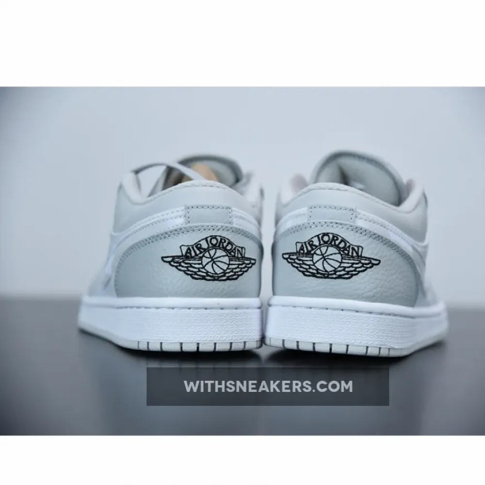 Air Jordan 1 Low Grey Camouflage Sneakers with a Distinctive Design. DC9036-100
