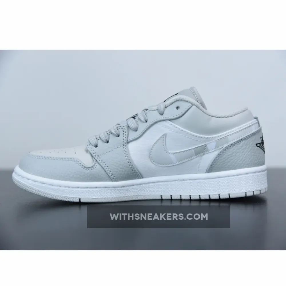 Air Jordan 1 Low Grey Camouflage Sneakers with a Distinctive Design. DC9036-100