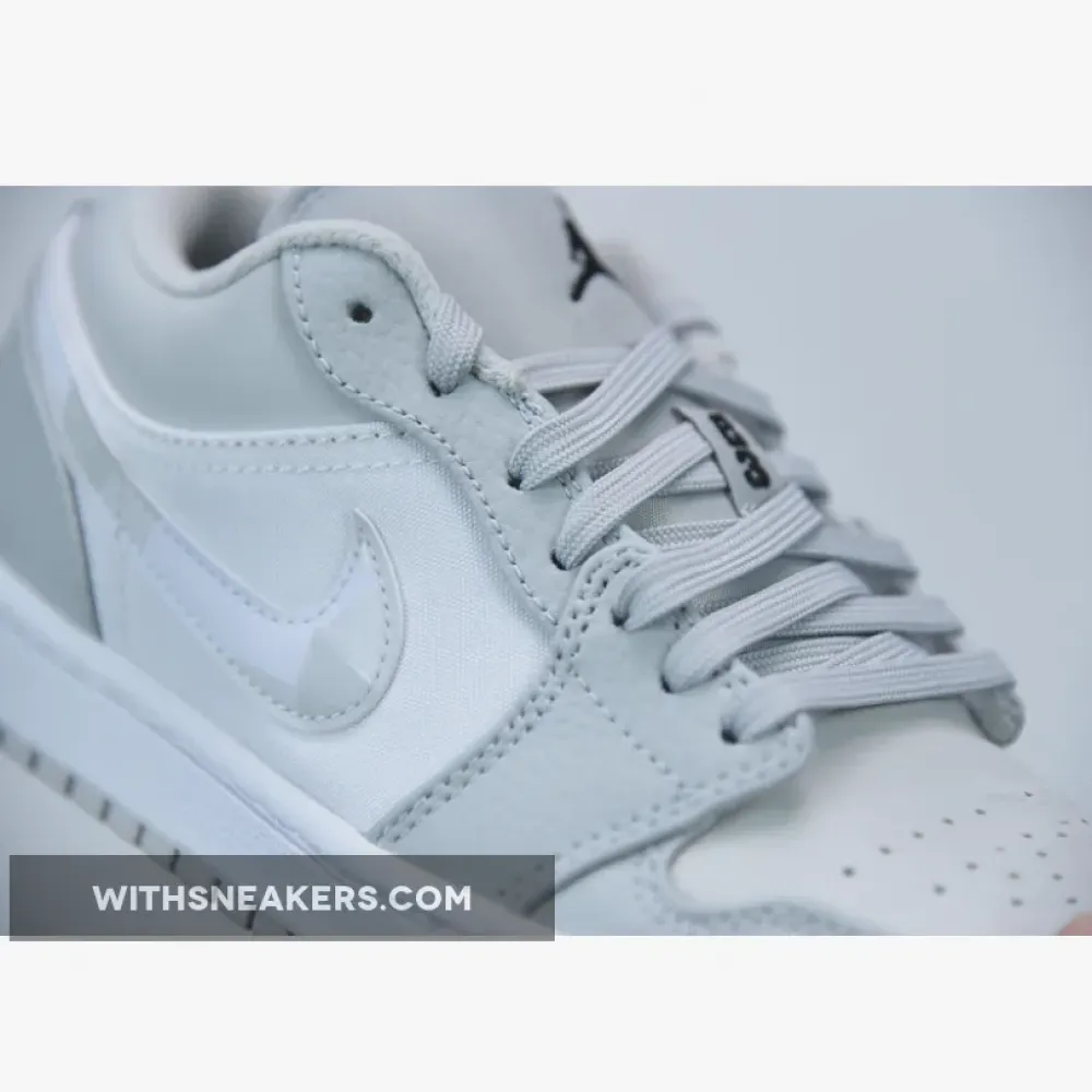 Air Jordan 1 Low Grey Camouflage Sneakers with a Distinctive Design. DC9036-100